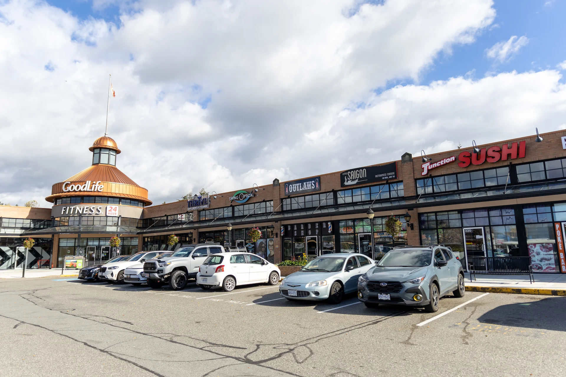shopping plaza with retail stores and parking in Mission BC near Cedar Valley community